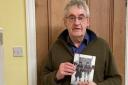 Ian Clarke with his new poetry book 'Staying On'.