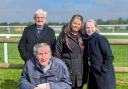 Residents including Richard at Fakenham Racecourse with deputy manager Sarah
