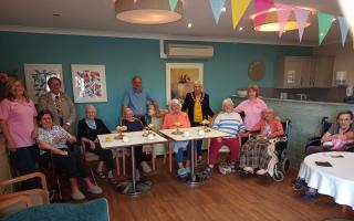 To mark Dementia Action Week, staff and residents at Rose Lodge care home in Wisbech were gifted memory boxes filled with retro Cadbury chocolate bars.