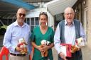Jim Whitehead (R) has supplied over 32,000 teddy bears to Addenbrooke's Hospital over the past 20 years. He's pictured with Paediatric health play specialist, Sophie Barber (middle) and secretary of Cambridge lodge, Tony Barrios (L).