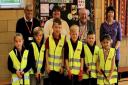 Pupils at Gorefield Primary Academy try out their new litter picking equipment with, back from left, Gorefield Street Pride volunteer, Alan Holt; Gorefield Street Pride Chair, Cllr Sam Clark; Fenland District Council’s Portfolio Holder for the