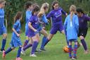 It's hoped a new partnership between Whittlesey Athletic and Whittlesey Juniors can help provide a clear pathway for young footballers to develop. Here, aspiring female footballers playing at the second Inter School Girls Festival in 2019, organised by