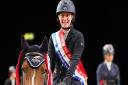 A show jumping mum from the Fens has won big at the British championships with her 13-year-old horse, Gigant. Picture: 1st Class Images
