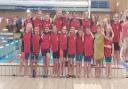 Wisbech Swimming Club youngsters face the camera at the latest Junior Fenland League gala