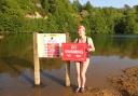 Protest swimmer Imogen Radford at Bawsey Country Park