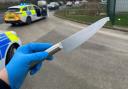 This large kitchen knife was recovered from the man's waist band.