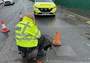 Officers cordoned off the affected areas with traffic cones.