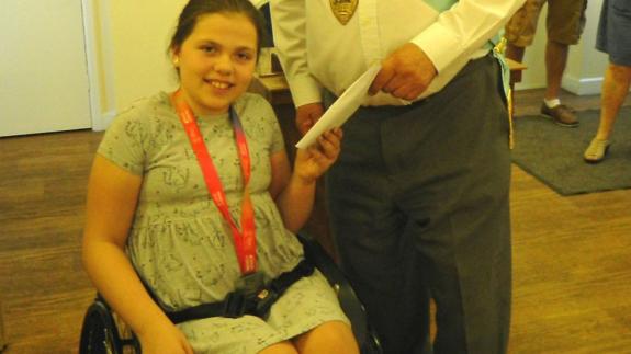 Wisbech Standard: Chloe Lewis (pictured at Buffs) has donated £1,300 to Buffs Locomotive Lodge based at the March Braza Club after competing in the junior wheelchair race at the London Marathon. Picture: Submitted Wisbech Standard: Chloe Lewis (pictured at Buffs) has donated £1,300 to Buffs Locomotive Lodge based at the March Braza Club after competing in the junior wheelchair race at the London Marathon. Picture: Submitted