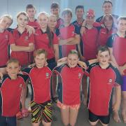Wisbech swimmers face the camera at the Anglian League gala in Whittlesey