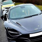 Police posted a picture of a  McLaren 720S – with a price tag of around £200,000 - that was seized on the A1M near Peterborough for having no insurance.