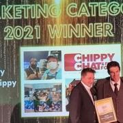Isle of Ely director Oliver Boutwood and Austen Dack collect the marketing award at the National Potato Awards 2021.