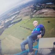 Chatteris daredevil Gregg Mann during his charity wing walk.