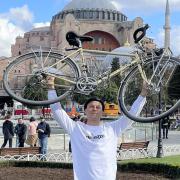 Matt Bryan (pictured) cycled from Burwell to Istanbul, raising over £2,000 for Cambridge Community Arts. He's pictured here in Istanbul on September 23.