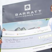 Cambridgeshire, Peterborough and South Lincolnshire (CPSL) Mind were given a £1,000 donation by homebuilder Barratt and David Wilson Homes. Catherine Keating, community fundraiser at CPSL Mind, with Barratt and David Wilson Homes Cambridgeshire sales