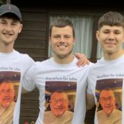 Three friends, Alex Redhead, Harrison Deighton and Bobby Manchett (L-R), ran a marathon in memory of Harrison’s grandfather John Taylor.