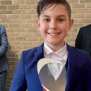 Liam Osler with his trophy after winning the 'Young Inspirational DJ of the year' award. Liam is pictured with Pino Soccio and David Carr from Fenland Youth Radio.