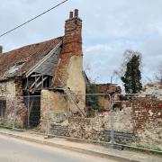 Three derelict cottages at 29 Dovecote Road, Upwell, Wisbech, are to be sold in an online auction.