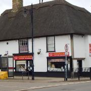 The Grade II-listed property on Market Street in Whittlesey includes two fully occupied flats and two commercial units.