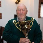 Golf results and a trophy for Gary.