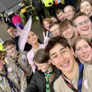 The Scouts managed to get a selfie with pop superstar Katy Perry with Katy Perry outside the Abbey following the Service.  Wisbech Explorer Scout Henry Fuller is pictured next to Katy on the left.