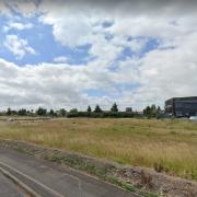 This derelict riverside plot on the Nene Waterfront in Wisbech will be built on