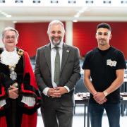 The Mayor of Wisbech, Peter Human (L) and boxer Jordan Gill (R) joined Principal Richard Scott at the Thomas Clarkson Academy end-of-term awards night.