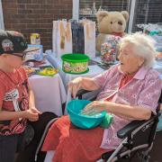 Care home resident Betty at the stall