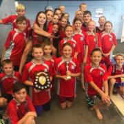 Wisbech JFL winners 2023 team with team captains Jake Trundle and Isabella Burton with the winner shield