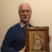 Author Bryan Wiles, with the copy that he carved of the Tadeusz Zielinski icon, the Mother of God Victorious, which was displayed at the altar before all the battles of the Second Polish Corps