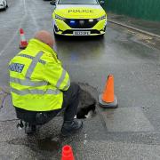 Officers cordoned off the affected areas with traffic cones.