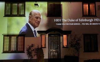 Photographic memories of the late Prince Philip are being projected onto a home in Barton Road, Ely until Sunday, April 25.