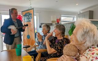 Banjo Man performing for residents at Hickathrift House Care Home in Wisbech